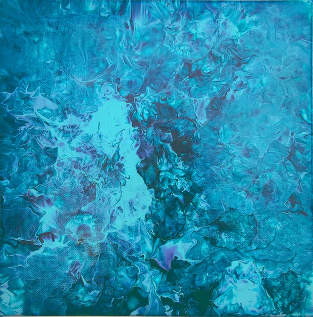 Blue and turquoise layers break into pale, branching forms.